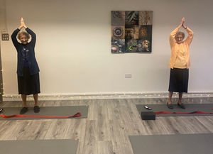 Lilian and Doris doing yoga