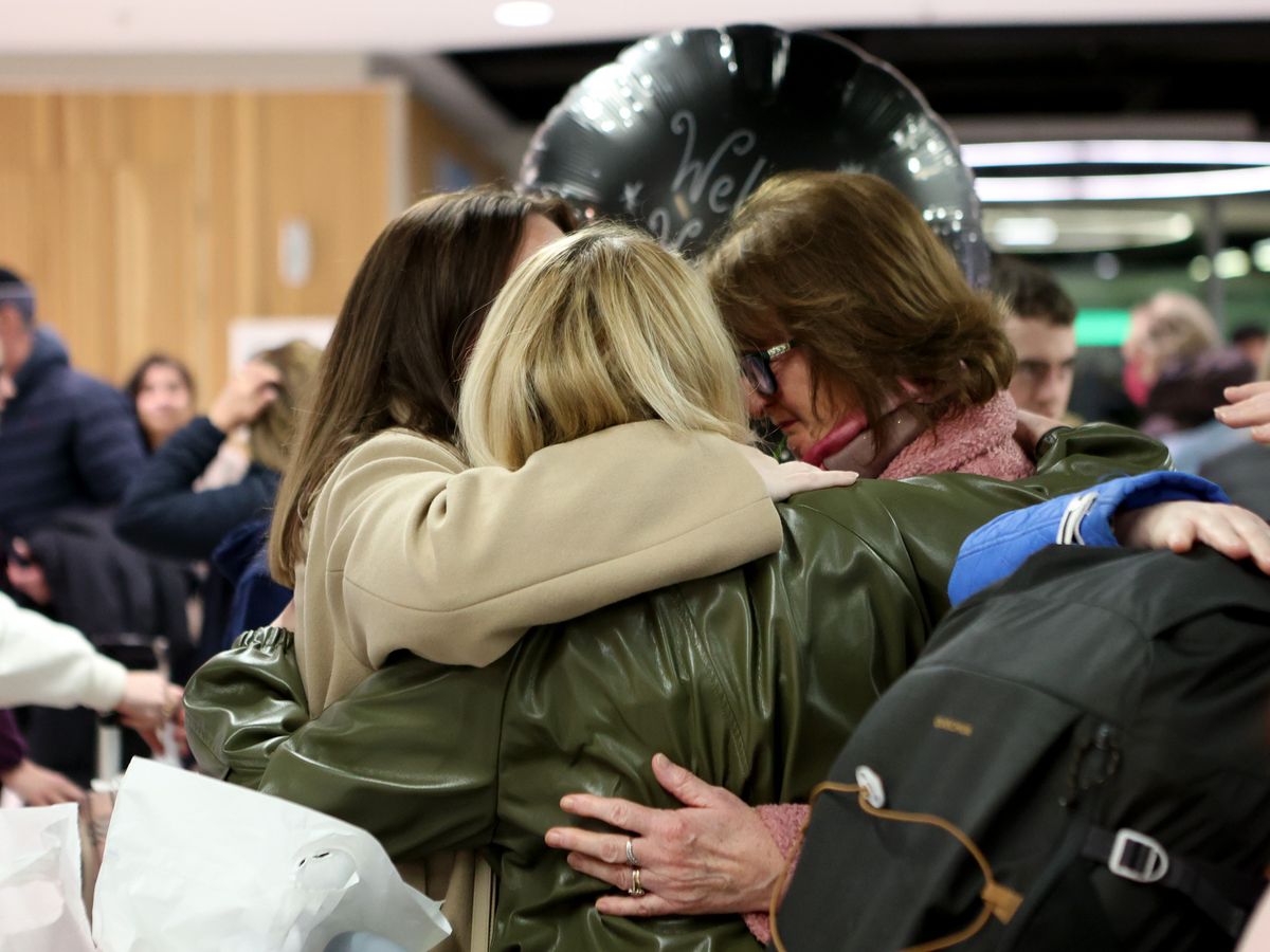 Relieved family reunions at Dublin Airport as chartered flight lands