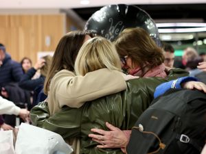 Supporting image for story: Relieved family reunions at Dublin Airport as chartered flight lands