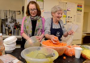In the kitchen at the Good Shepperd is Helen Holloway and Elise Hawthorne