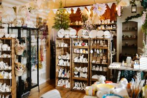 Inside the boutique are shelves full of different items to be painted