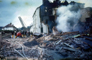 Smoke was still rising at daybreak.