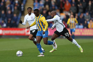 Dan Udoh of Shrewsbury Town and Sone Aluko of Ipswich Town (AMA)