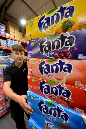 Joe showcasing five different flavours of American Fanta.