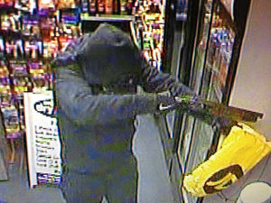 Supporting image for story: E&S Comment: Gun-toting thug not too young to have committed the crime