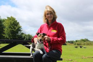 Jane is pictured with six-year-old Jack Russell, Jack. Photo: Dogs Trust