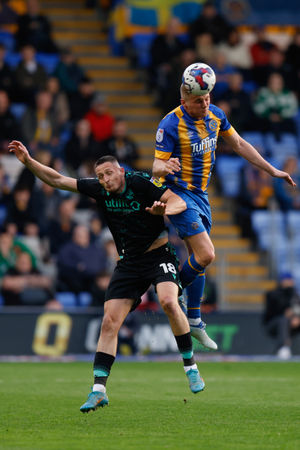 Taylor Moore of Shrewsbury Town and Ryan Loft of Bristol Rovers (AMA)