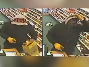 Supporting image for story: Caught on camera: Sleeping tablets robber fought off with plastic box