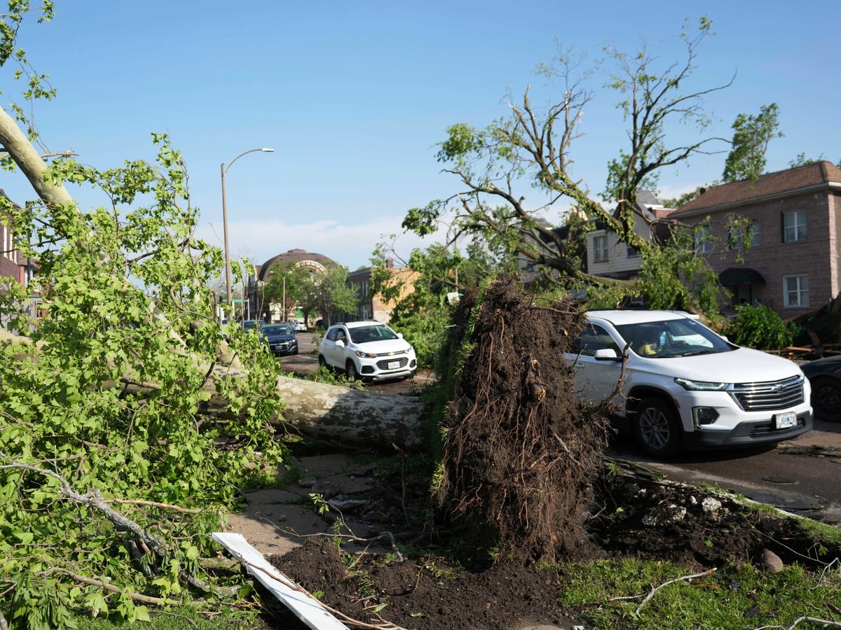 At least five dead after tornado and severe storms batter St Louis, mayor says