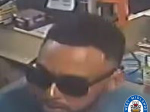 Supporting image for story: Police want to speak with this man pictured in shades after a Halesowen woman aged in her 90s was burgled