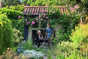 George and Fiona Chancellor in their garden at Windy Ridge in Little Wenlock