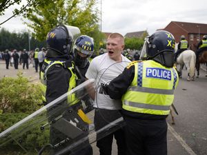 Supporting image for story: Engineer jailed for charging at riot police who were guarding hotel
