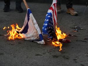 Supporting image for story: Iran warns against US strikes as activists say protest death toll reaches 203