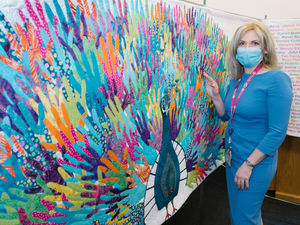 Supporting image for story: Many hands make light work of beautiful mural of unity at Shropshire hospital