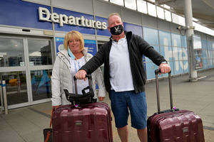 Colin Briton and Julie Sarnaz ahead of their flight to Spain