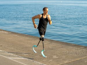 Paralympian Richard Whitehead running with prosthetic legs