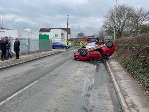 Supporting image for story: Dramatic pictures emerge of Oswestry crash where car flipped onto its roof