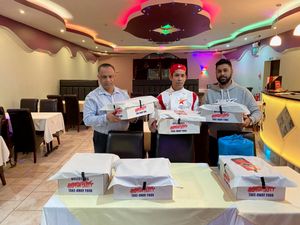 Supporting image for story: Curry house given award for helping the community in the pandemic