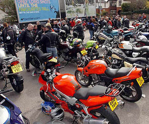 Bikers wait in the Wylie and Holland Motorcycles car park, ready for the parade.nextpage