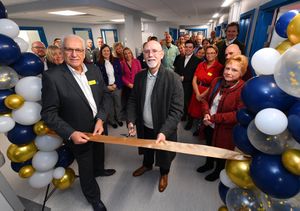 Former patient Nick Taylor cuts the ribbon. Photo: Tim Thursfield