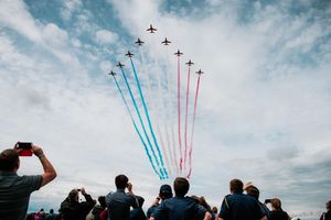 People enjoying a Red Arrow performance.