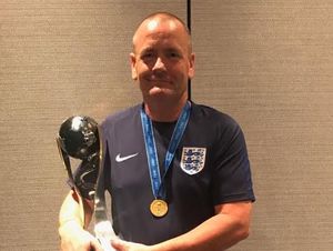 Pat Frost with the Under 20 World Cup trophy, which England won in 2017