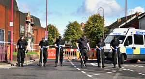 Police scour Brierley Hill High Street for evidence after the stabbing