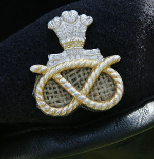 A rope knot forms part of the design of Staffordshire Regiment cap badge
