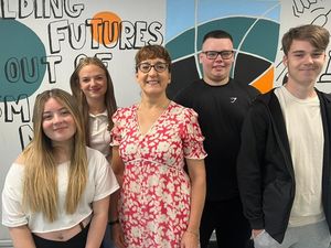 Principal Nikki Jones celebrates with students on their achievements after receiving their GCSE results.