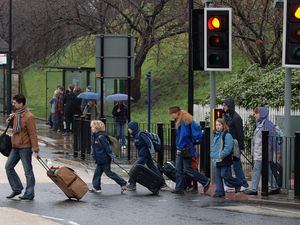 People crossing the road