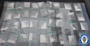 Suspected Class A and B drugs were found inside dealer bags already packaged up and ready to be sold at the property in Dudley. (Photo: West Midlands Police)