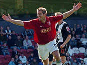 Supporting image for story: Harriers lose Butler to Burton