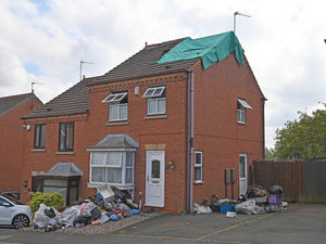 Supporting image for story: 'There was this sudden big burst of light, then it was just fire': Residents react after house's roof is destroyed by lightening