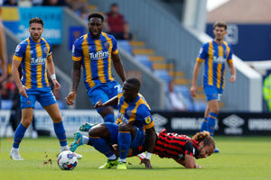 Dan Udoh of Shrewsbury Town and Marcus Harness of Ipswich Town (AMA)
