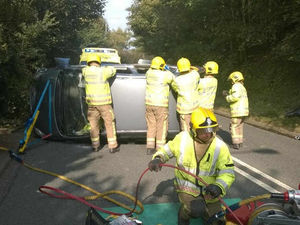 Supporting image for story: Busy road blocked after car overturns