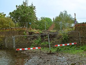 Supporting image for story: Work starts on repair of historic Telford dam wall more than 12 months after it was destroyed by tree