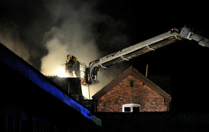 Crews were using an aerial ladder platform to fight the flames