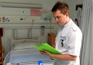 Staff Nurse Kieran Povey goes about his tasks at the hospital