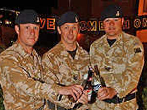 Supporting image for story: Families' joy as troops return