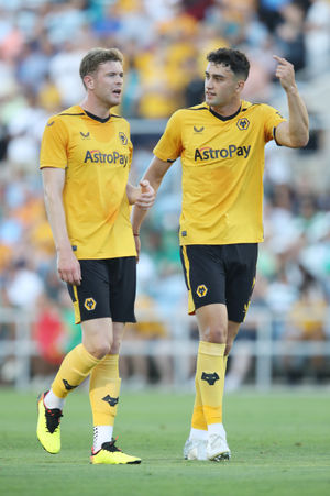 FARO, PORTUGAL - JULY 30: Max Kilman of Wolverhampton Wanderers speaks with Nathan Collins during the pre-season match between Wolverhampton Wanderers and Sporting CP at Estadio Algarve on July 30, 2022 in Faro, Portugal. (Photo by Jack Thomas - WWFC/undefined).