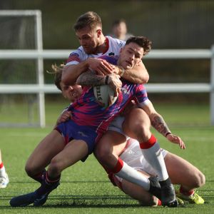 The tackling was ferocious from both sides. Photo: Andy Shaw