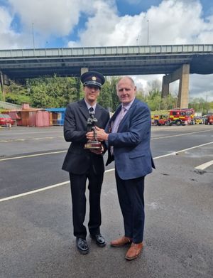 The Recruits' Recruit award was presented to Rhys Tucker by Fire Authority Chair, Councillor Gwynfor Thomas.