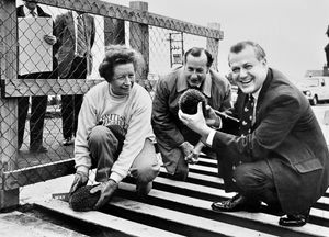 Major Adrian Coles, right, with his wife Pam, and Simon Kenyon-Slaney, with two hedgehogs trying out the escape ramp in the new cattle grid which was officially opened at Clee Hill on October 18, 1982.