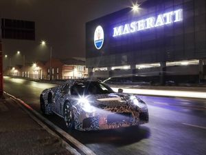 Supporting image for story: New Maserati sports car teased with camouflaged test mule