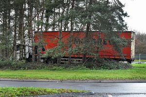 A crashed lorry sits amongst the trees at Forton Island, near Newport