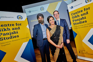 Dr Opinderjit Takhar (centre) who is a lecturer at the University of Wolverhampton