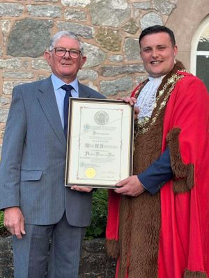 Eric Humphries (left, pictured with new Much Wenlock Mayor, Councillor Dan Thomas), received a Freeman of the Town. Picture: Much Wenlock Town Council