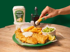 The new Heinz 'Fish & Chips Sauce' next to a plate of fish and chips