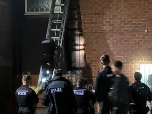 Supporting image for story: Police pictured at Wellington Market as burglary suspect arrested 