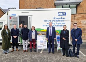 Professor Sir Chris Whitty meeting with staff outside Shrewsbury's Guildhall.